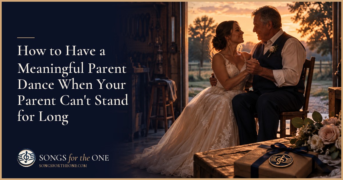 Newlywed seated beside their parent at the edge of a wedding dance floor, sharing a smile and holding hands.