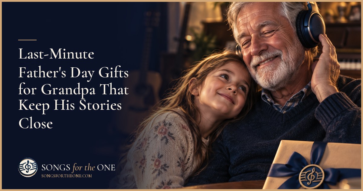 Grandpa sharing a family photograph with his granddaughter beside a wrapped pair of headphones and a Father's Day breakfast tray