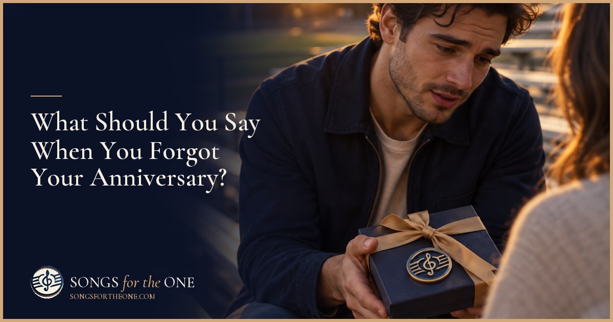 Partners talking across a kitchen table, with a small bouquet and a closed gift box set aside on the counter.